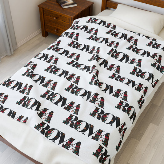 Soft fleece blanket with bold ROMA text in elegant serif font across the center.
