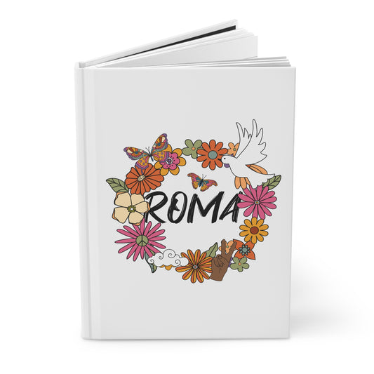 Soft-touch journal with raised ROMA lettering and baroque-style accents.