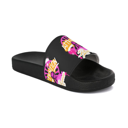 Sleek black slipper with curved upper and Roma circle design on heel