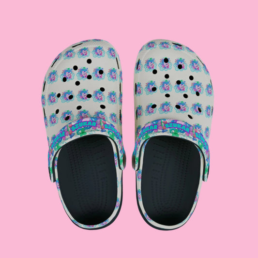 Fun Crocs showcasing vibrant unicorn patterns on the straps and sides.