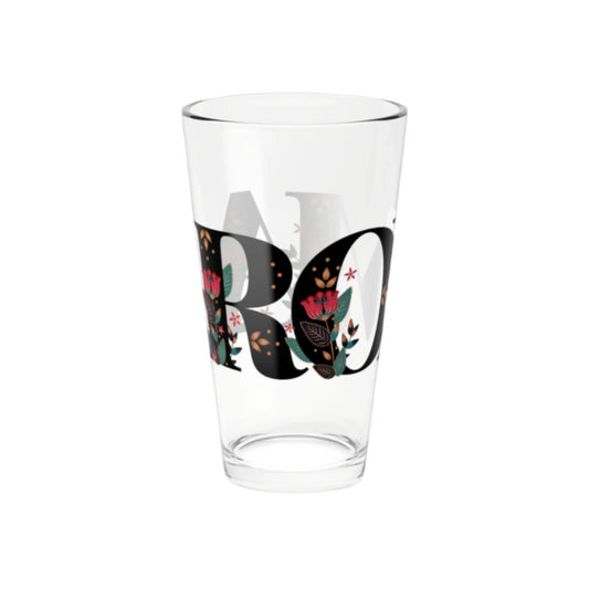 Glass tumbler with streetwear-inspired branding, ideal for cocktails and mocktails.