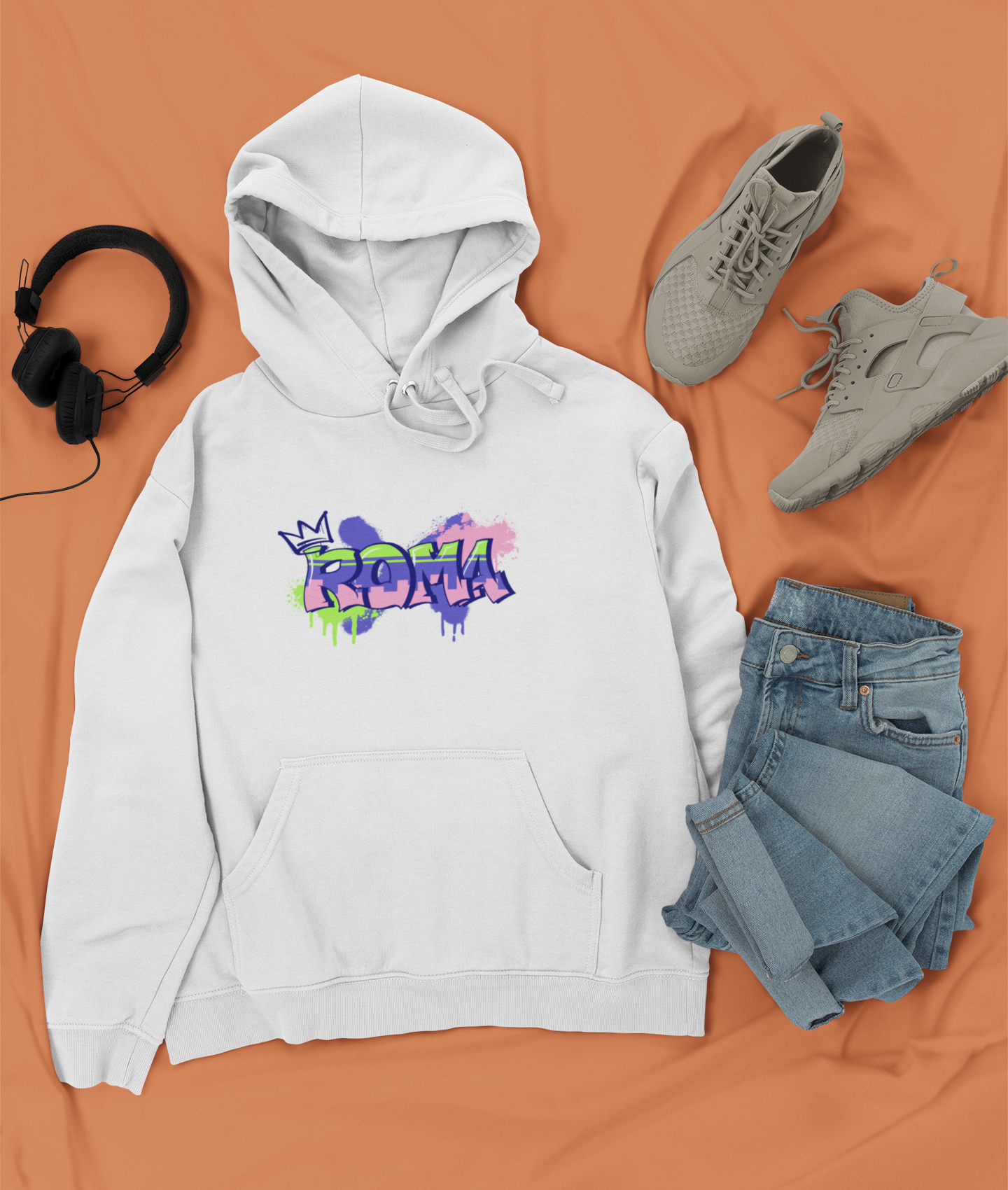 outfit-mockup-featuring-a-pullover-hoodie-next-to-trendy-sneakers-and-jeans
