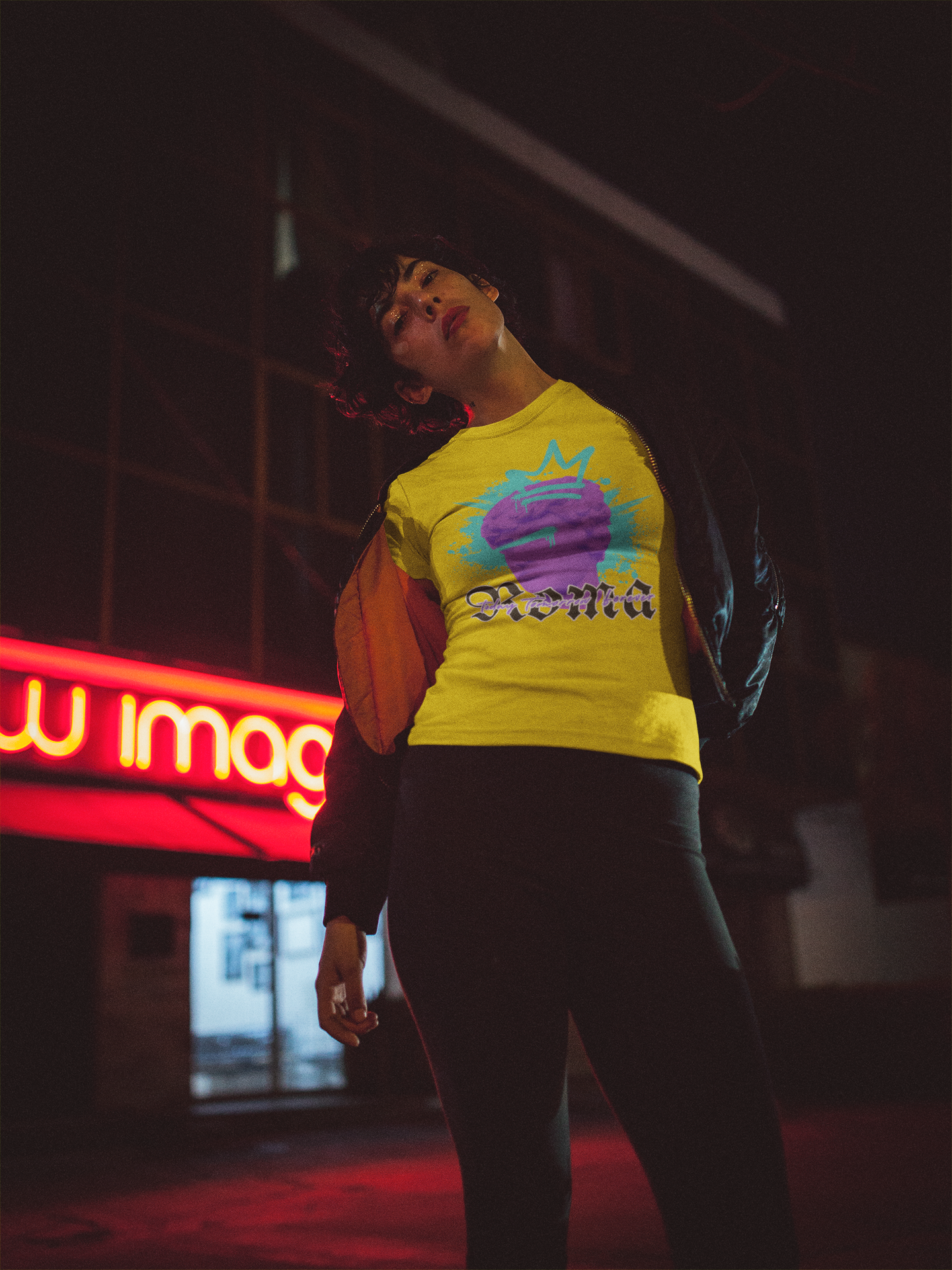 woman-wearing-a-t-shirt-mockup-outside-a-restaurant-at-night