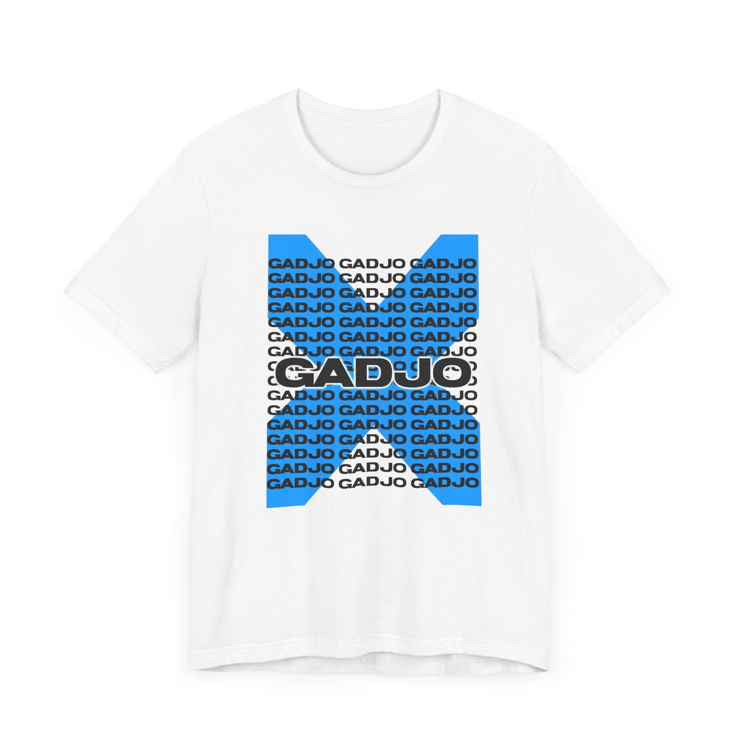Shirt design with GADJO text placed under a sketched skyline, blending city and tribe