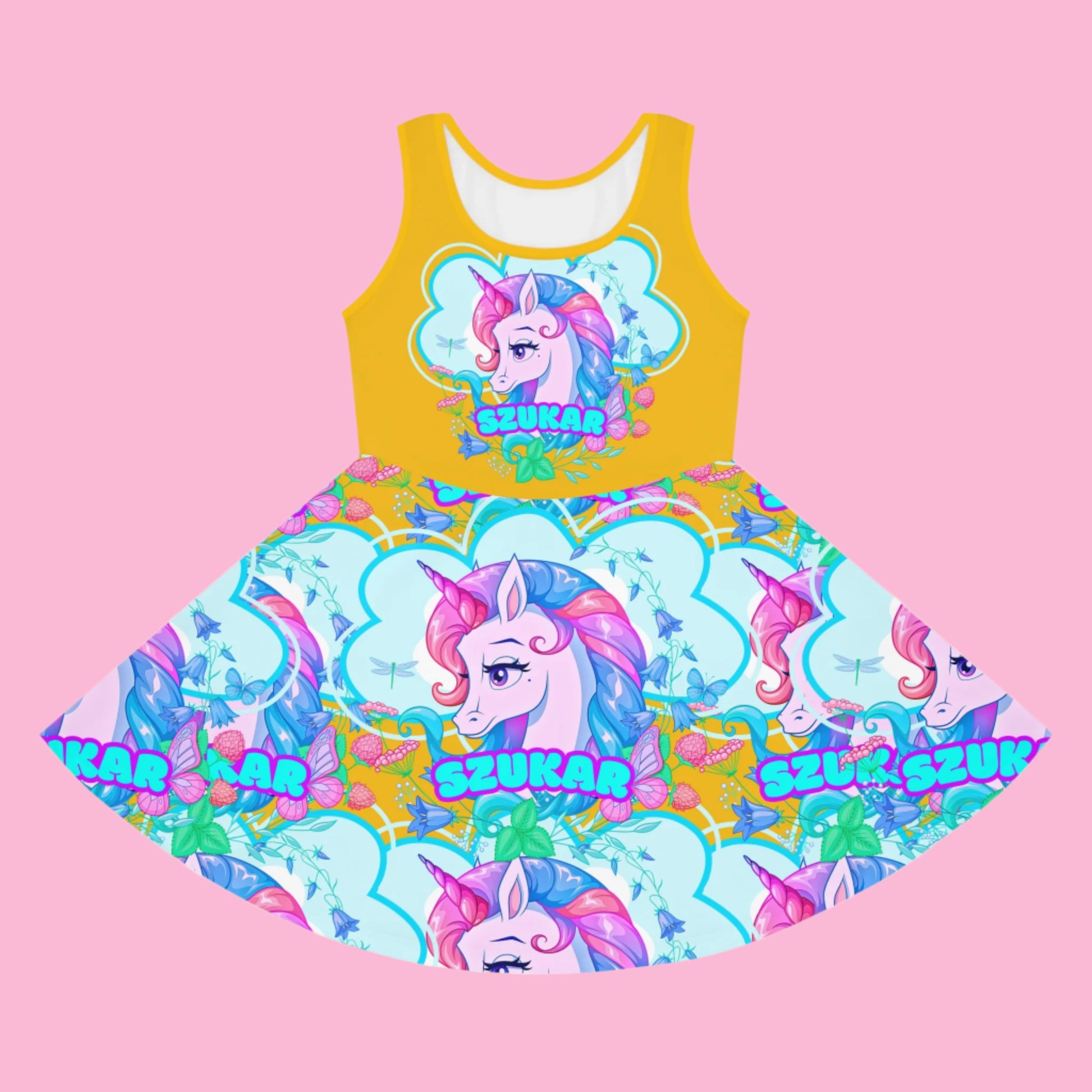 A yellow dress with unicorn designs from Szukar Roma.