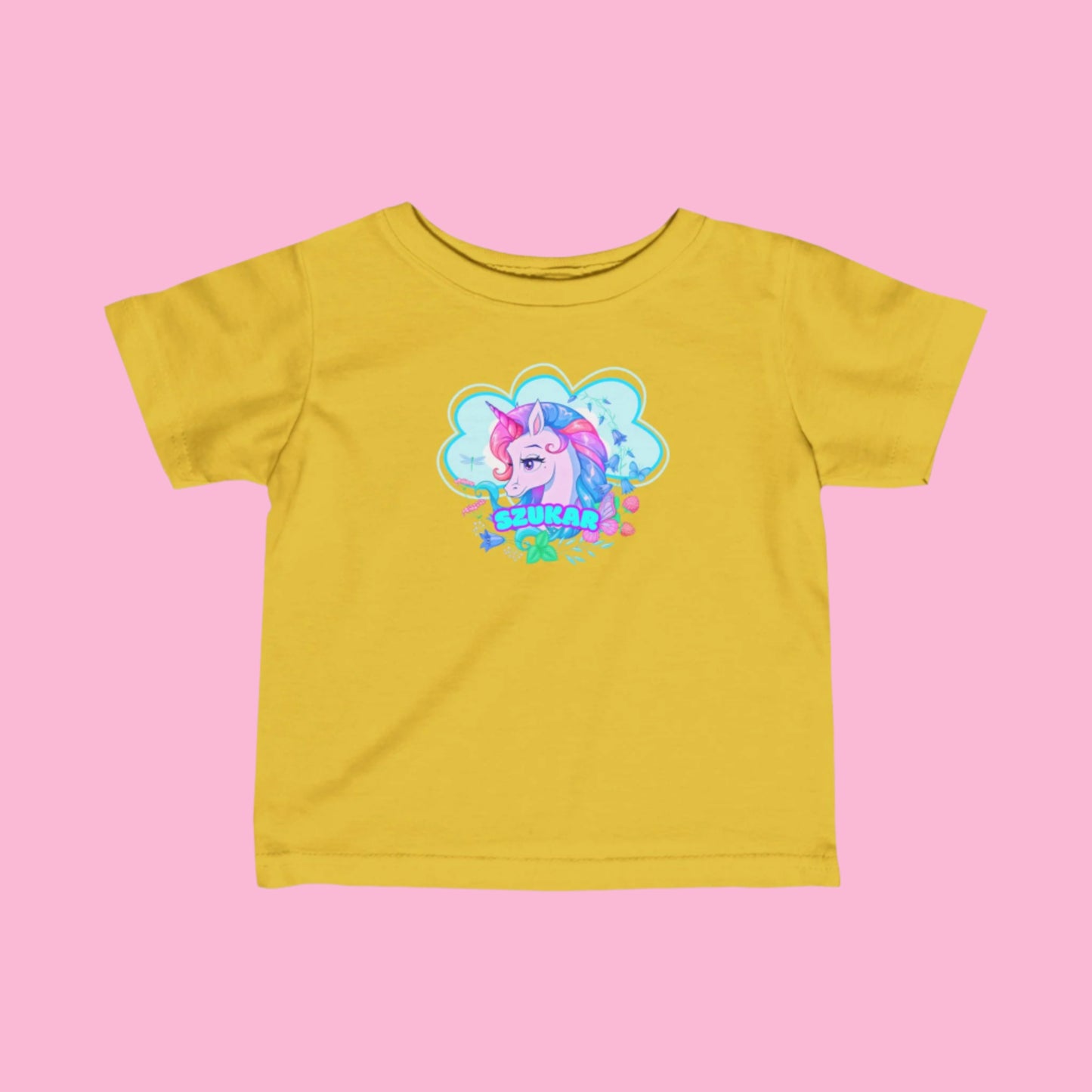 Playful kids’ t-shirt with a colorful unicorn surrounded by clouds and sparkles.