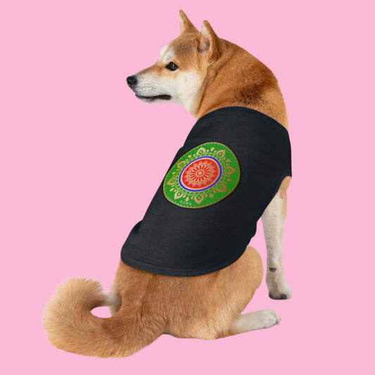 Small dog wearing a stylish black tank top with bold street-style graphics.