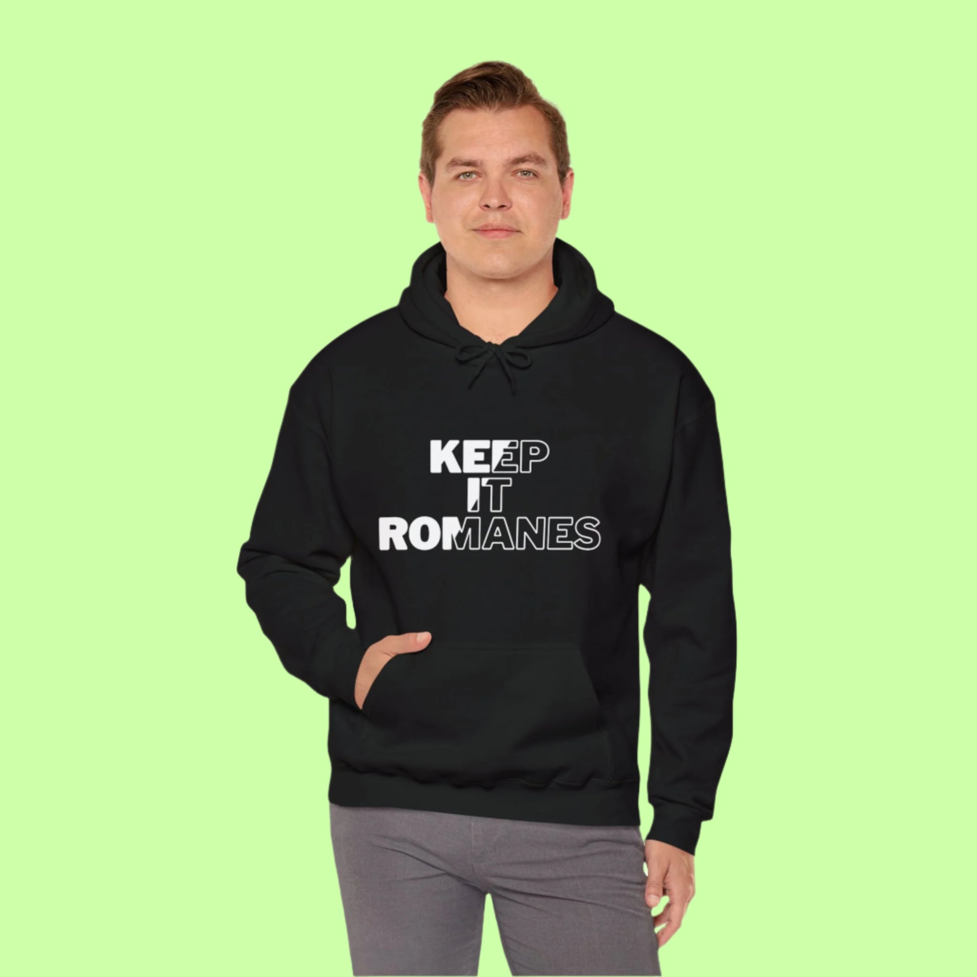 Minimalist black hoodie with powerful “KEEP IT ROMANES” text, blending identity and streetwear.
