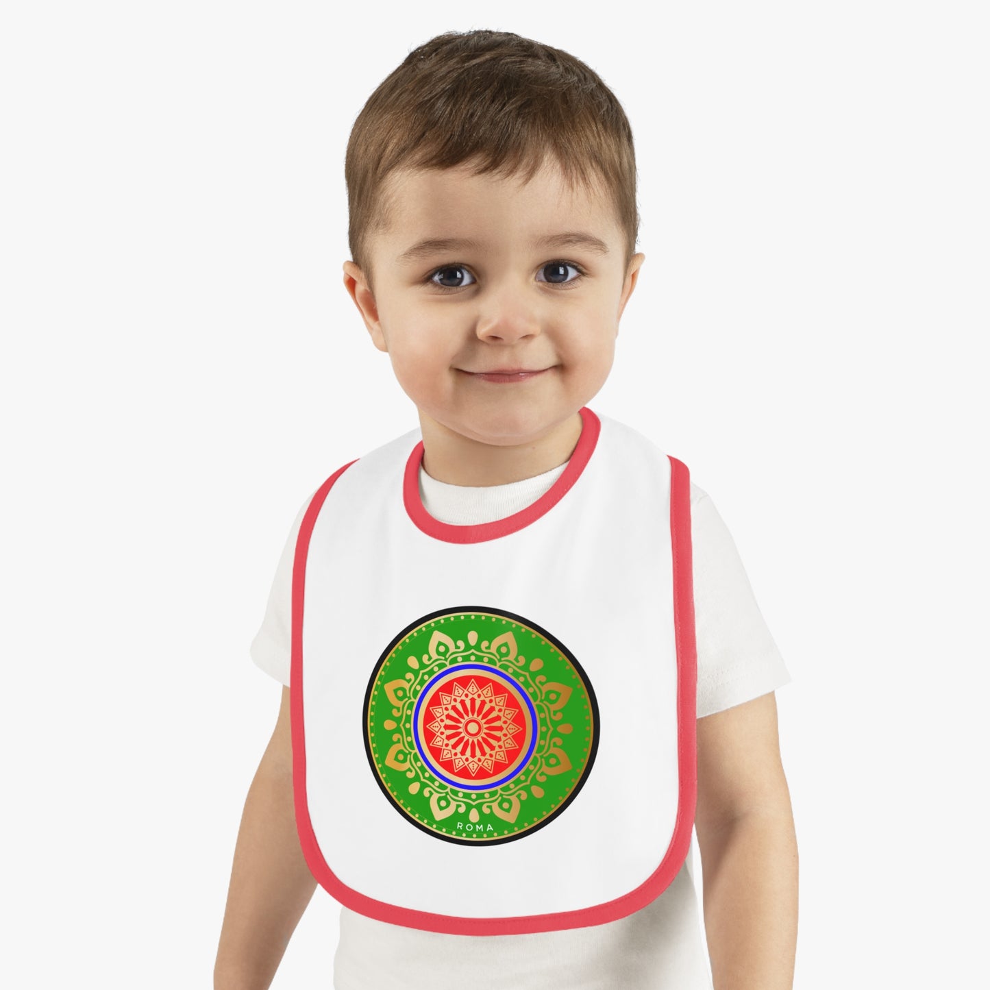 Joyful infant in a bib, grinning with pure delight.