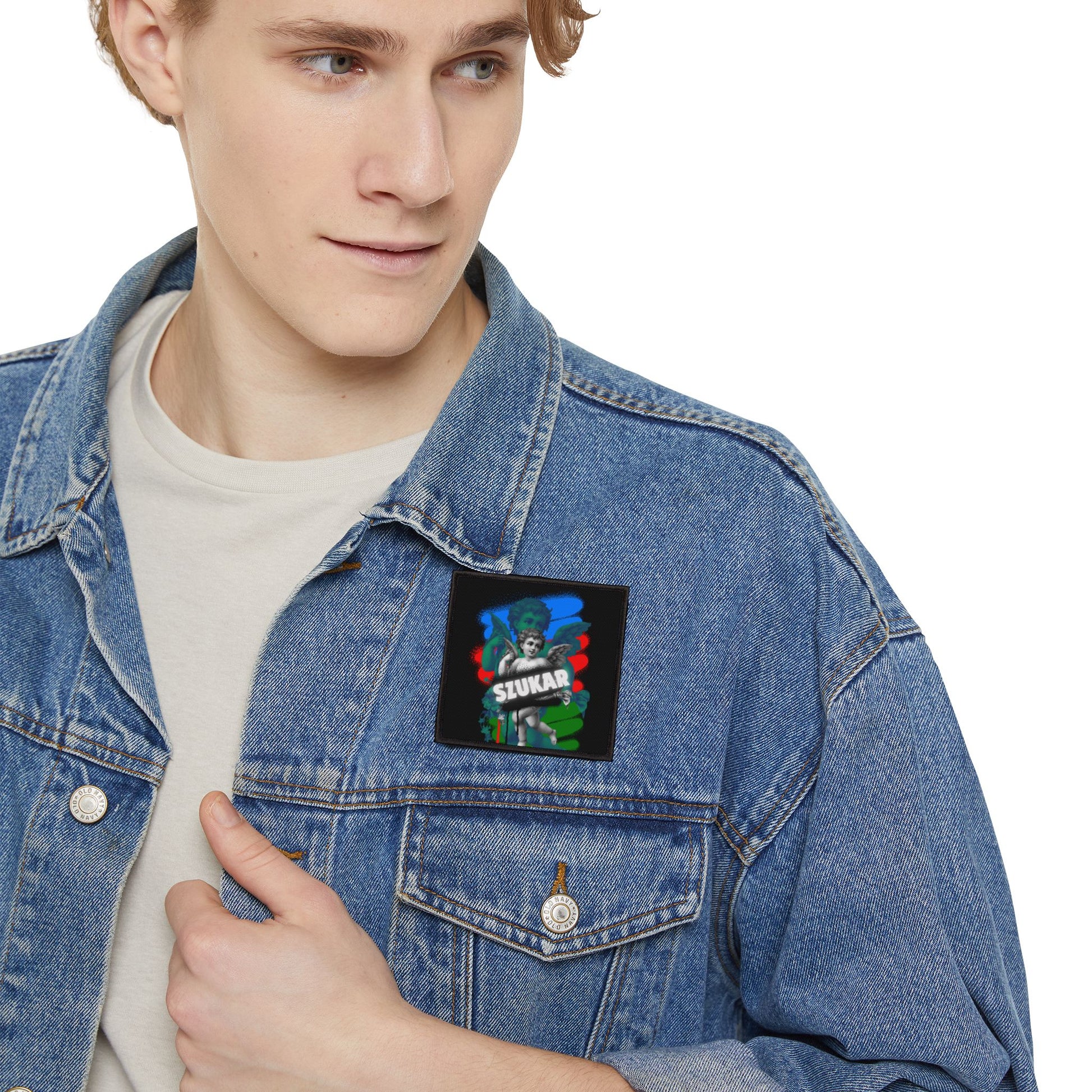 Colorful patch depicting an angel design, blending the distinctive colors of the Roma flag.