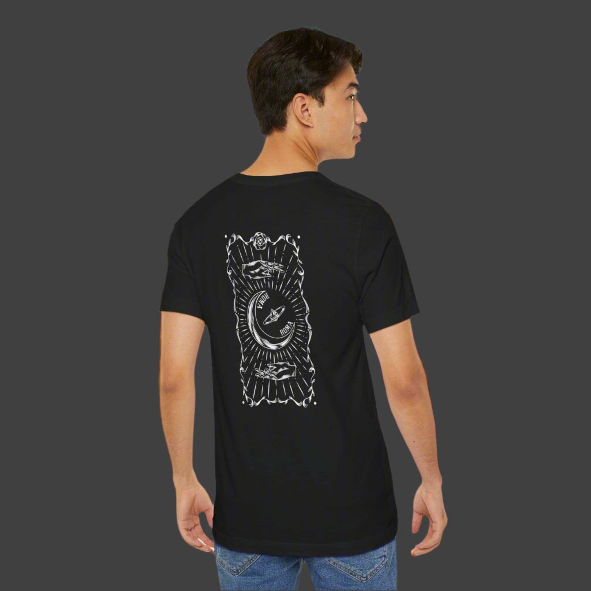 a man standing wearing 
Black  Roma T-Shirts Designs
short-sleeve tee featuring mystical moon art and standout ROMA lettering