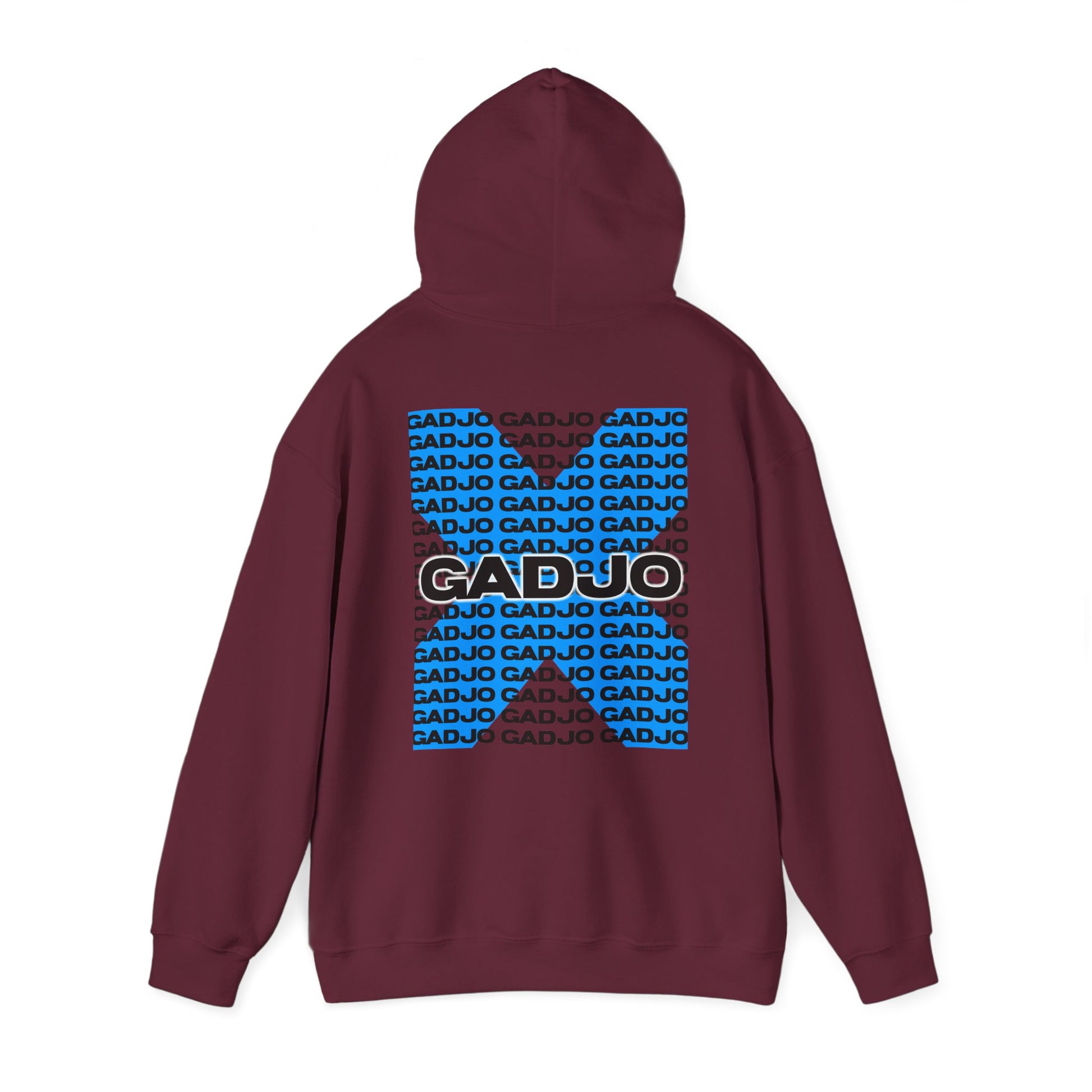 Urban hoodie featuring “GADJO” in cracked-stone typography, symbolizing resilience.


