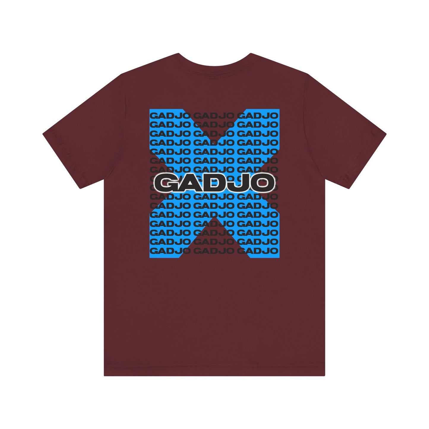 Minimalist t-shirt with small GADJO text printed over the heart, paired with a tiny crown icon.