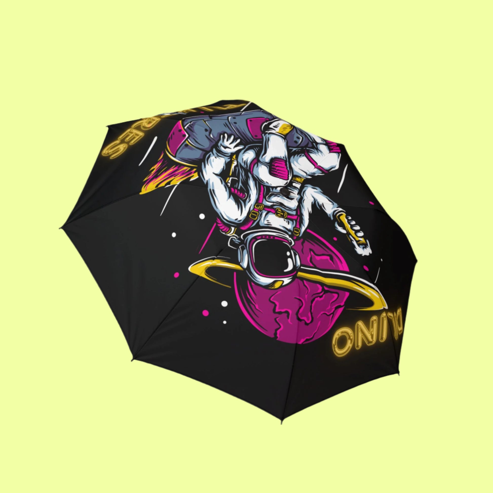 Stylish umbrella design with a lone astronaut in orbit and the phrase “SO TU KERES” grounding the theme.

