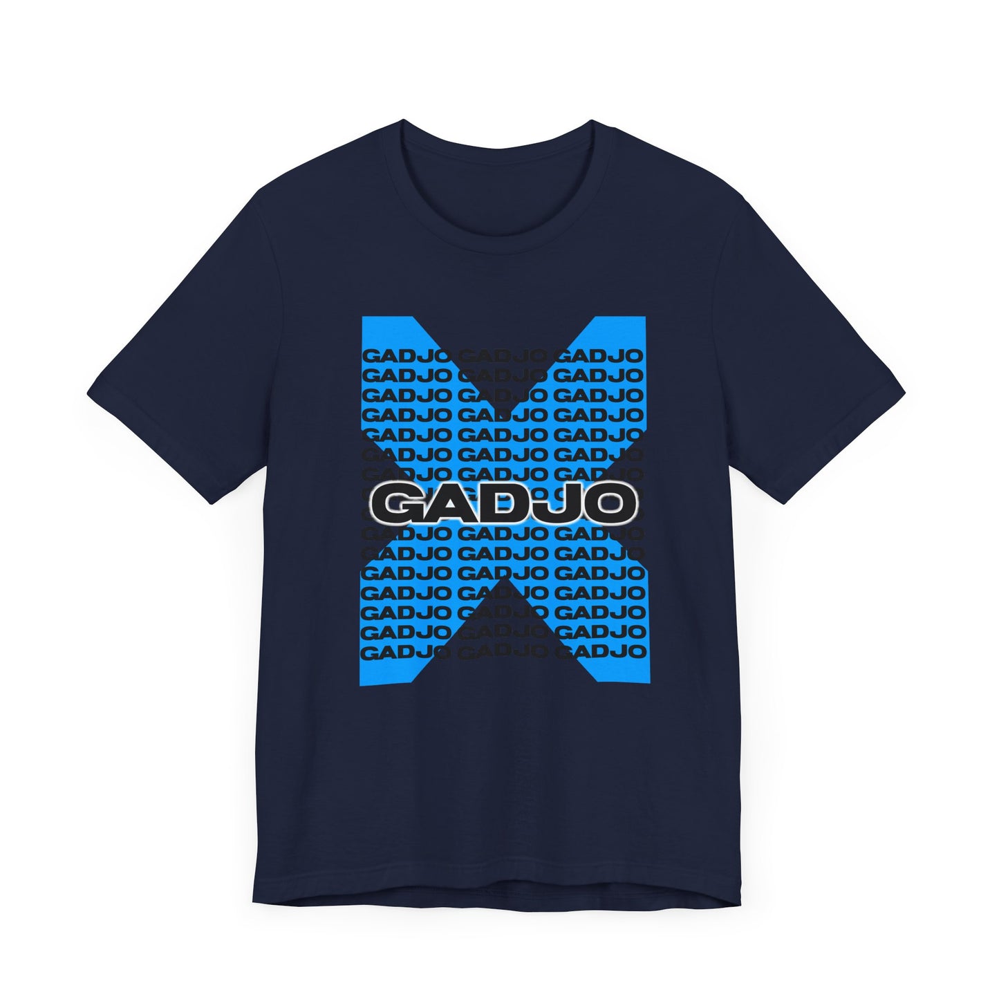 Grunge-style tee with cracked stone GADJO text centered over a smoky, abstract background.