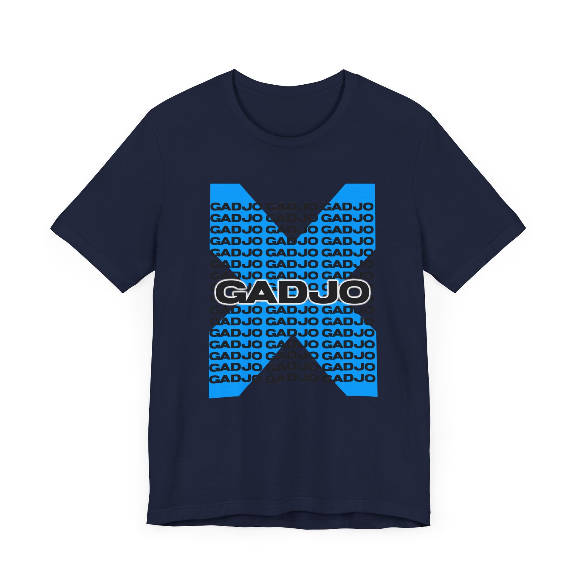 Grunge-style tee with cracked stone GADJO text centered over a smoky, abstract background.