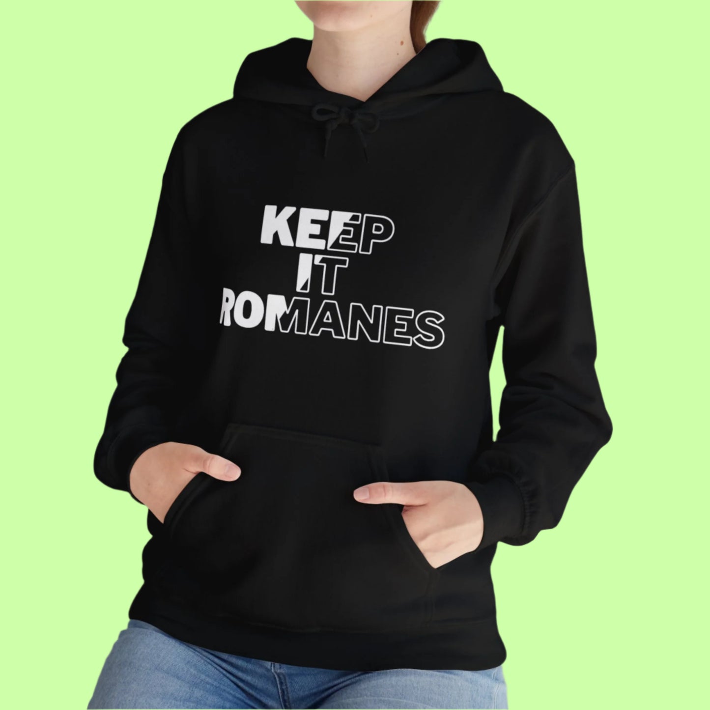 Statement hoodie in black featuring the words “KEEP IT ROMANES” in bold, all-caps typography.
