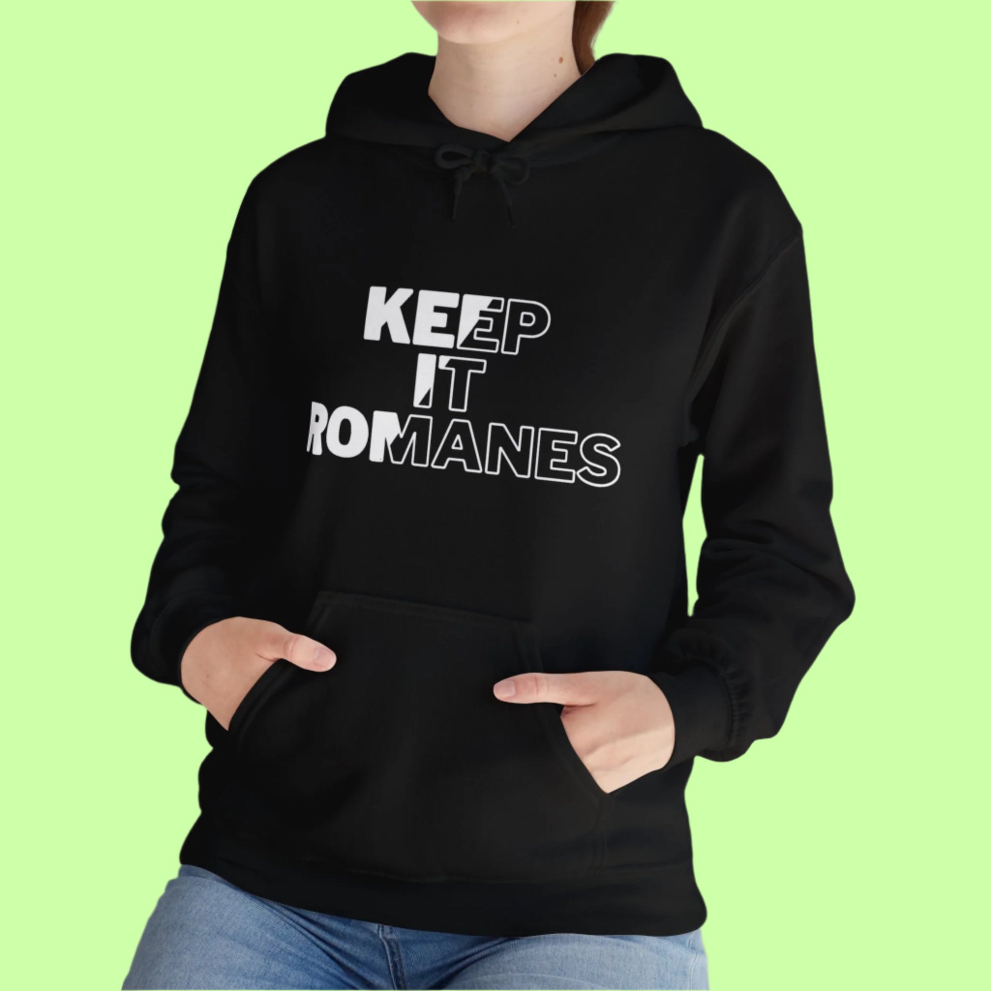 Statement hoodie in black featuring the words “KEEP IT ROMANES” in bold, all-caps typography.
