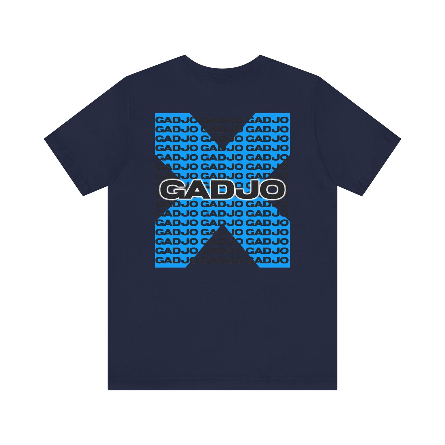 Minimal white shirt featuring small GADJO text and a faded Roma crown insignia behind it.
