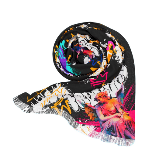 Colorful scarf with artistic design on a blue background