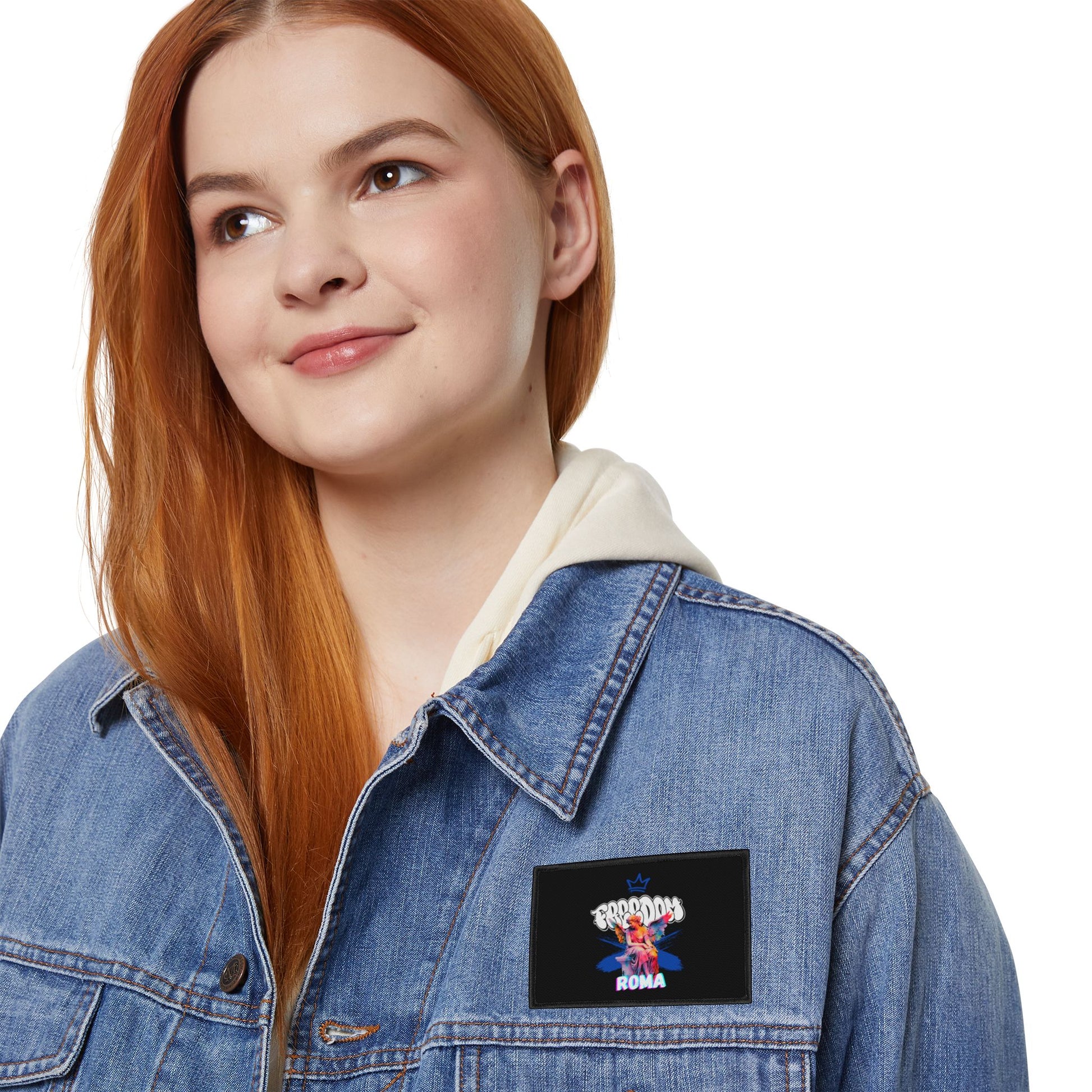 Detailed patch showing a graceful angel, topped with “FREEDOM” text and “ROMA” underneath.

