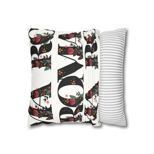 Decorative pillow with large, bold ROMA print on clean white fabric.
