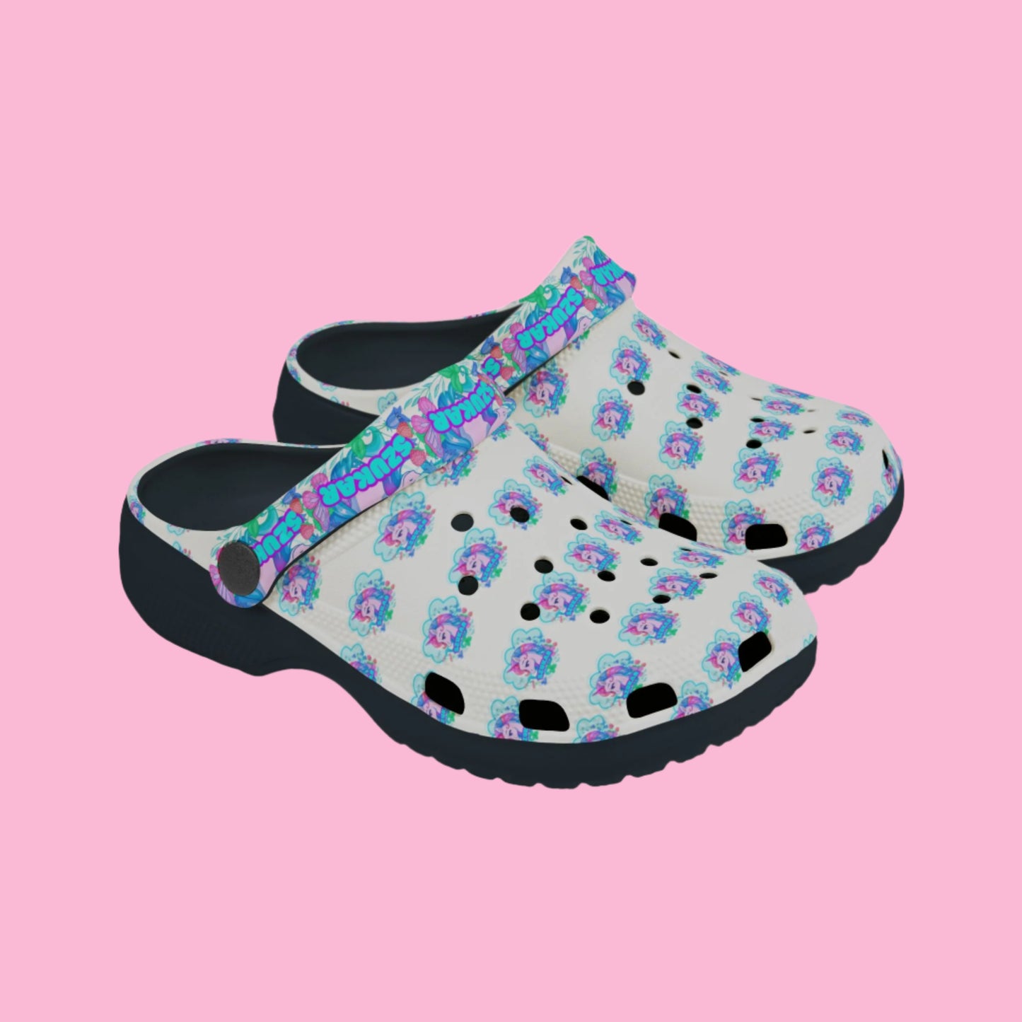 Pair of colorful Crocs decorated with playful unicorn graphics and rainbows.

