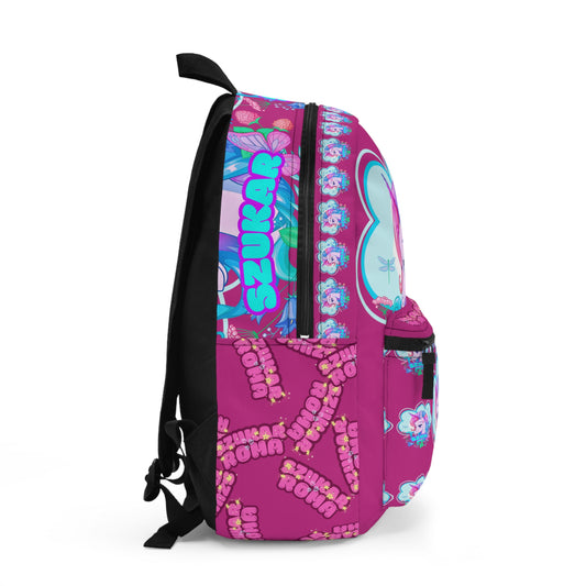 Playful pink backpack adorned with a colorful unicorn graphic and SZUKAR lettering.


