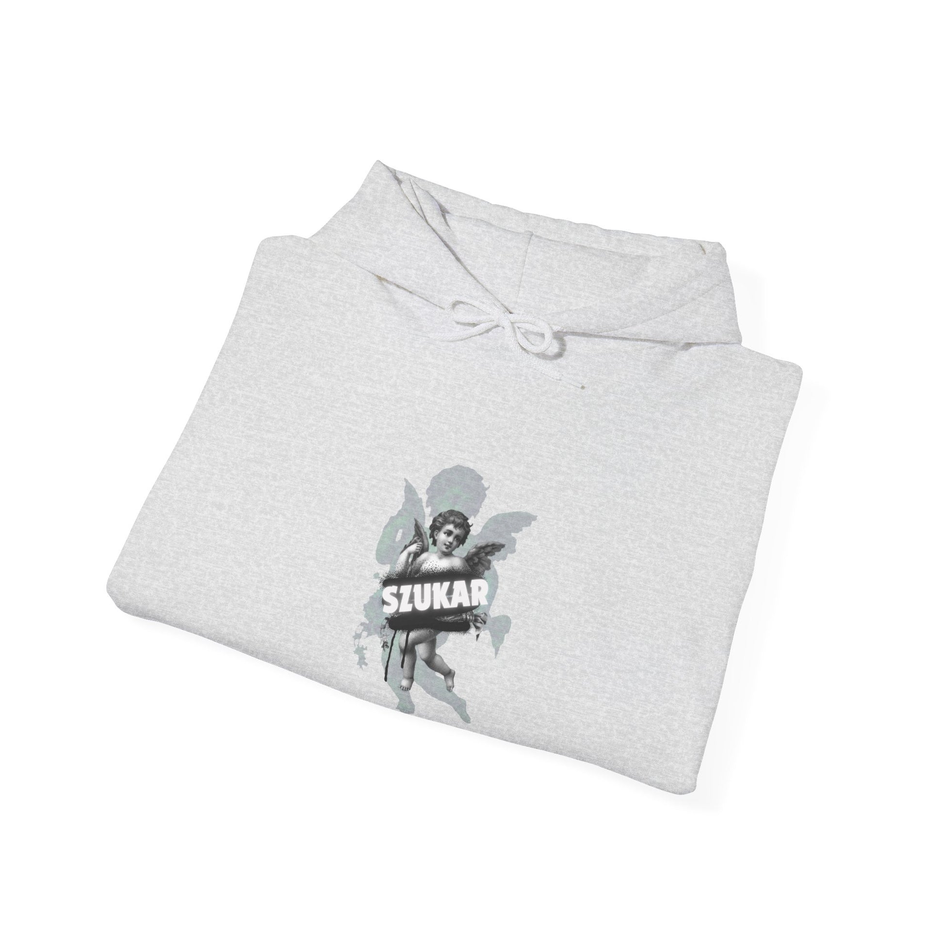 Angel-themed hoodie with artistic brushstroke background and signature ‘SZUKAR’ script.