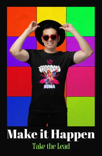 Person wearing a black t-shirt with colorful design and text against a multicolored geometric background.