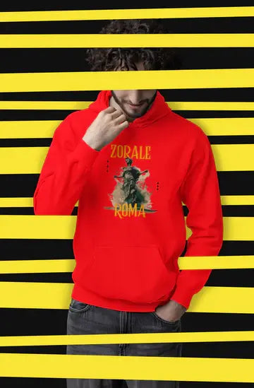 Person wearing a red hoodie with a graphic design on a yellow and black striped background