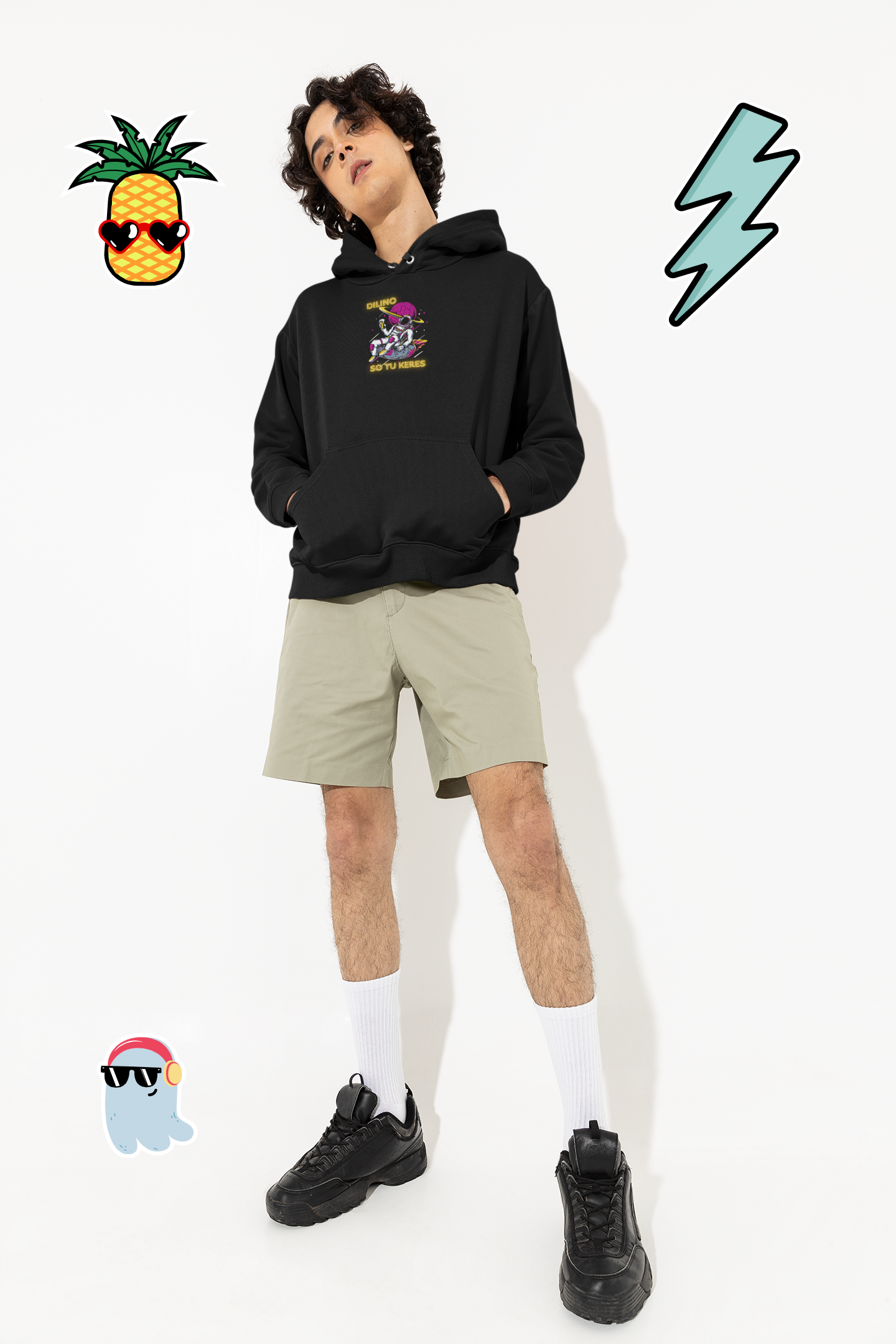 hoodie-mockup-of-a-young-man-in-a-studio-featuring-gaming-stickers